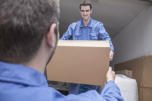 Van loading for a local Ilford house move with boxes and furniture