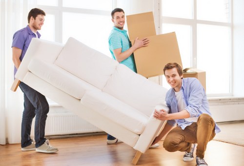 Loading household items into a removal van in Ilford