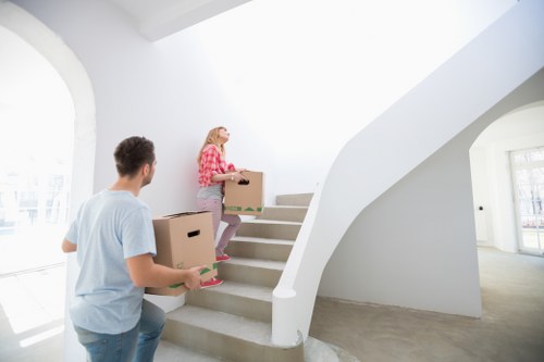 Van loading boxes and furniture for a house move in Ilford