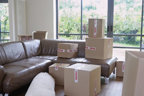 Local removals team handling careful delivery and unloading in Ilford